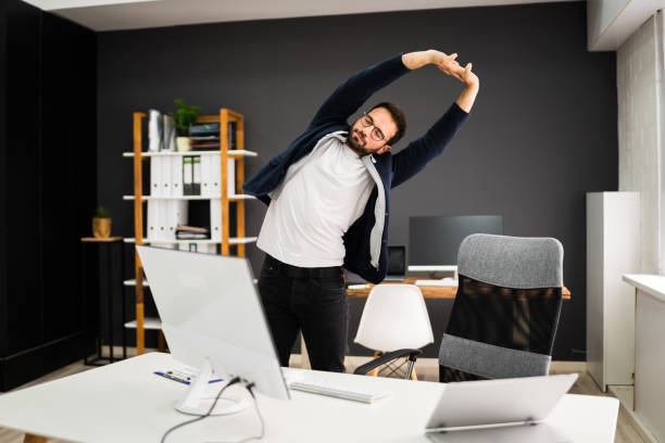 Office worker stretching during a micro-workout break